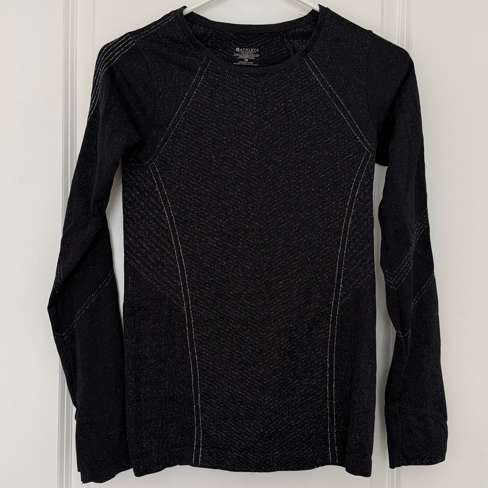 Athleta  XS black and silver sparkle long sleeve shirt. Like new.